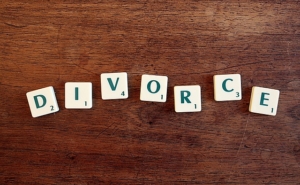 Does a spouse have to agree to a divorce in Clinton County, Michigan?