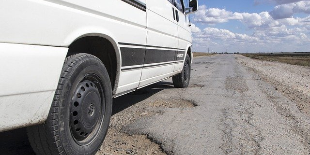 What to do if a defect in the road causes an accident in West Virginia?